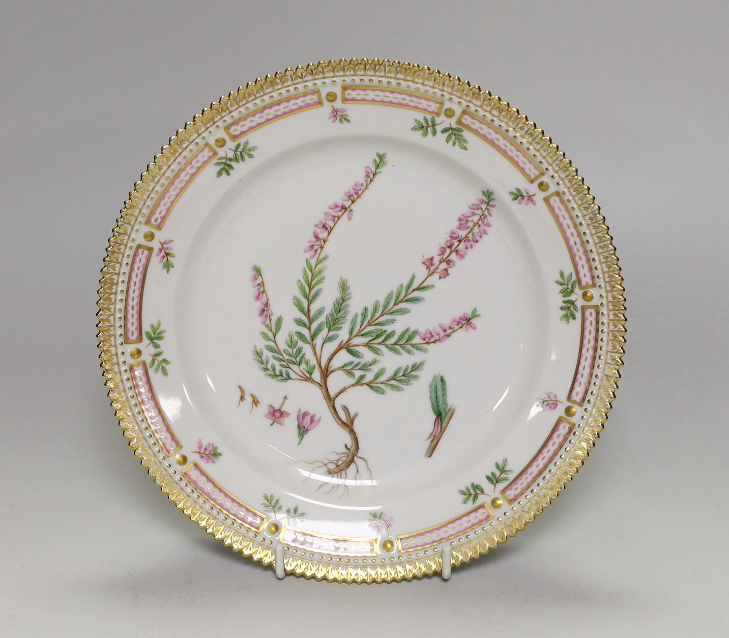 A Royal Copenhagen Flora Danica plate painted with Erica Vulgaris, titled, 22cm